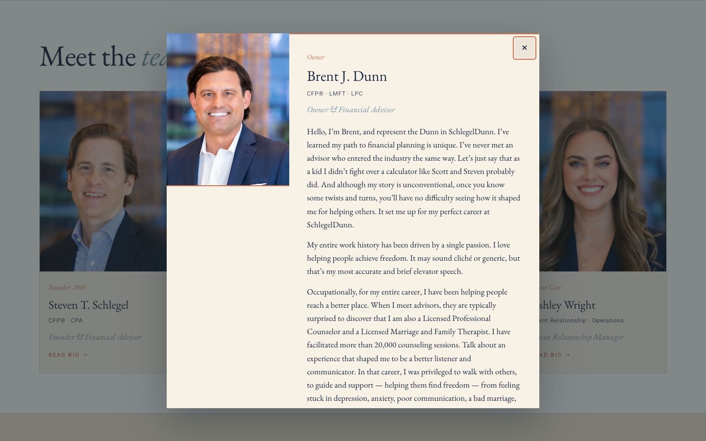 The Meet the team section with Brent Dunn's bio open in a dialog over the four team cards.